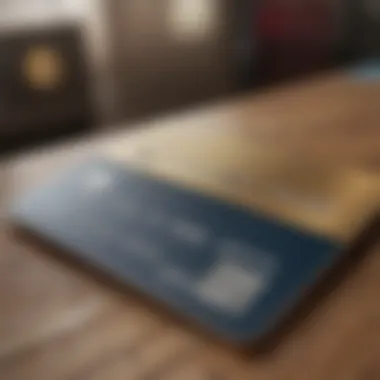 Close-up view of a credit card with business-related items in the background.