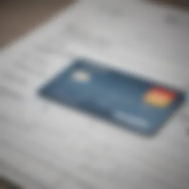 Financial Planning with Credit Card A close-up of a credit card on a financial planning worksheet