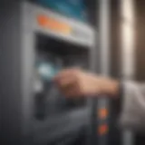 A credit card being inserted into an ATM slot