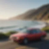 Scenic view of California coastline with a parked used car