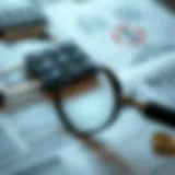 Close-up of a magnifying glass over financial documents