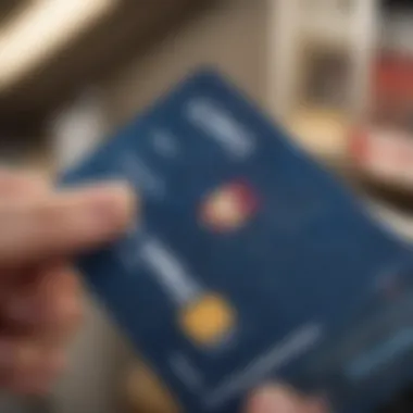 Close-up of a Lowe's card being swiped